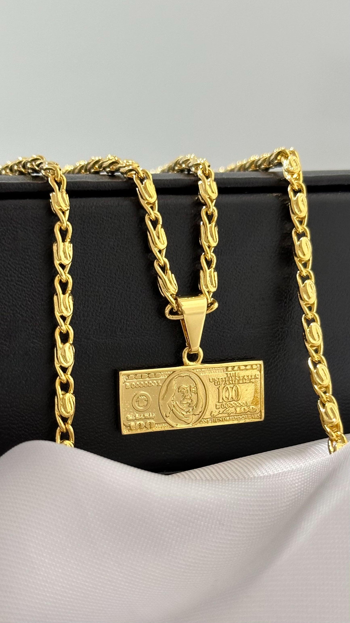 DIJE BILLETE DE 100 DOLARES