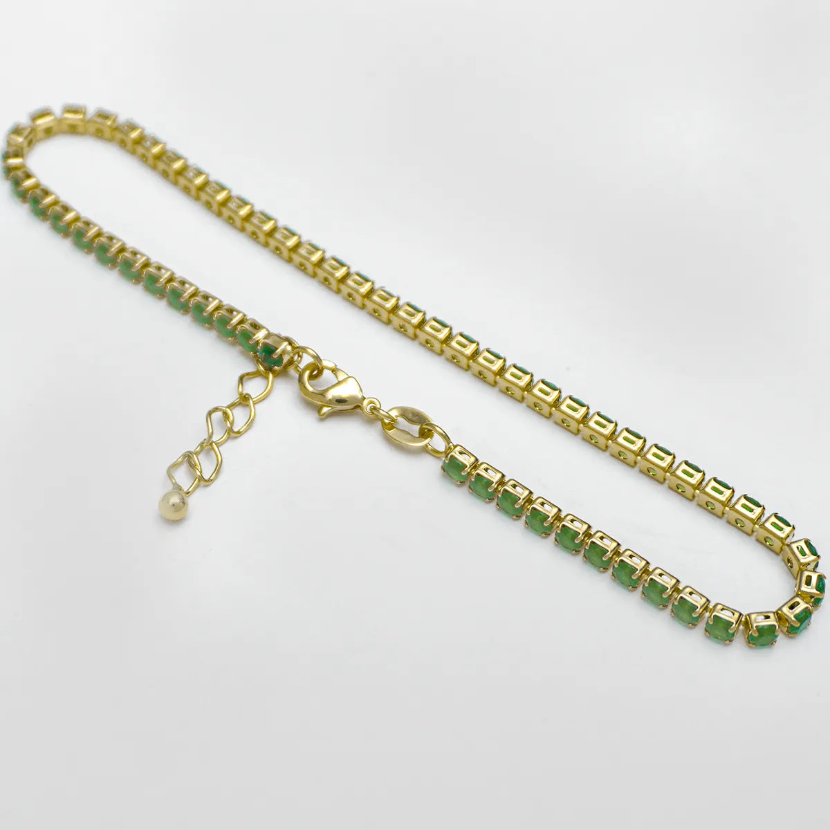 TOBILLERA CIRCONIAS 24 CMS VERDE
